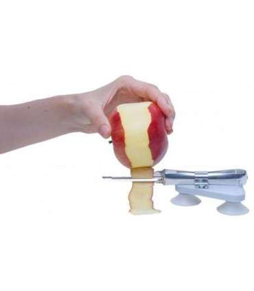 Suction cup mounted fruit and vegetable peeler
