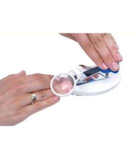 Nail clippers with magnifying glass