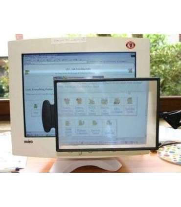 Table-top magnifier mounted on the tabletop